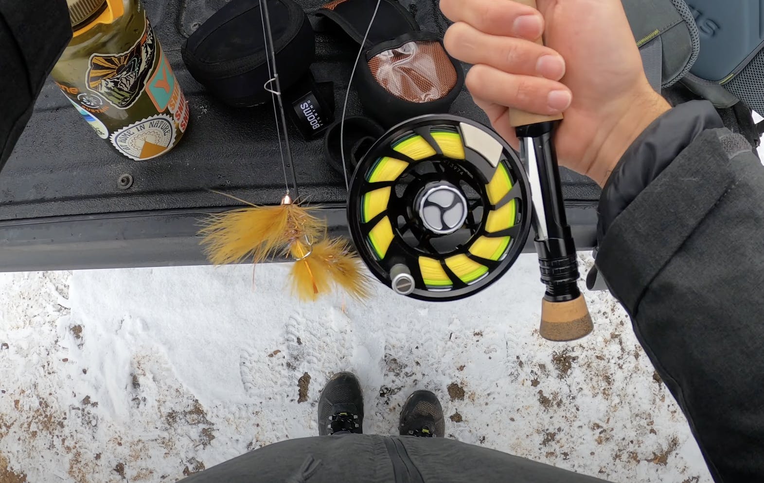 Top down view of the fly rod and reel with the Orvis Pro Depth Charge 3D Smooth Fly Line on it. 