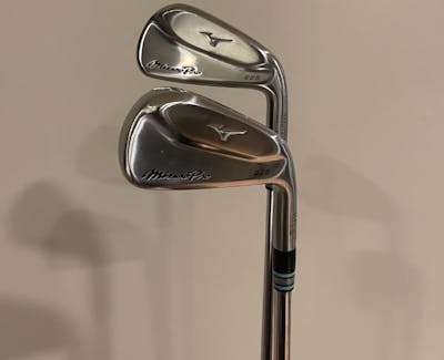 Back of the 6 iron and 7 Mizuno Pro 225 Irons.