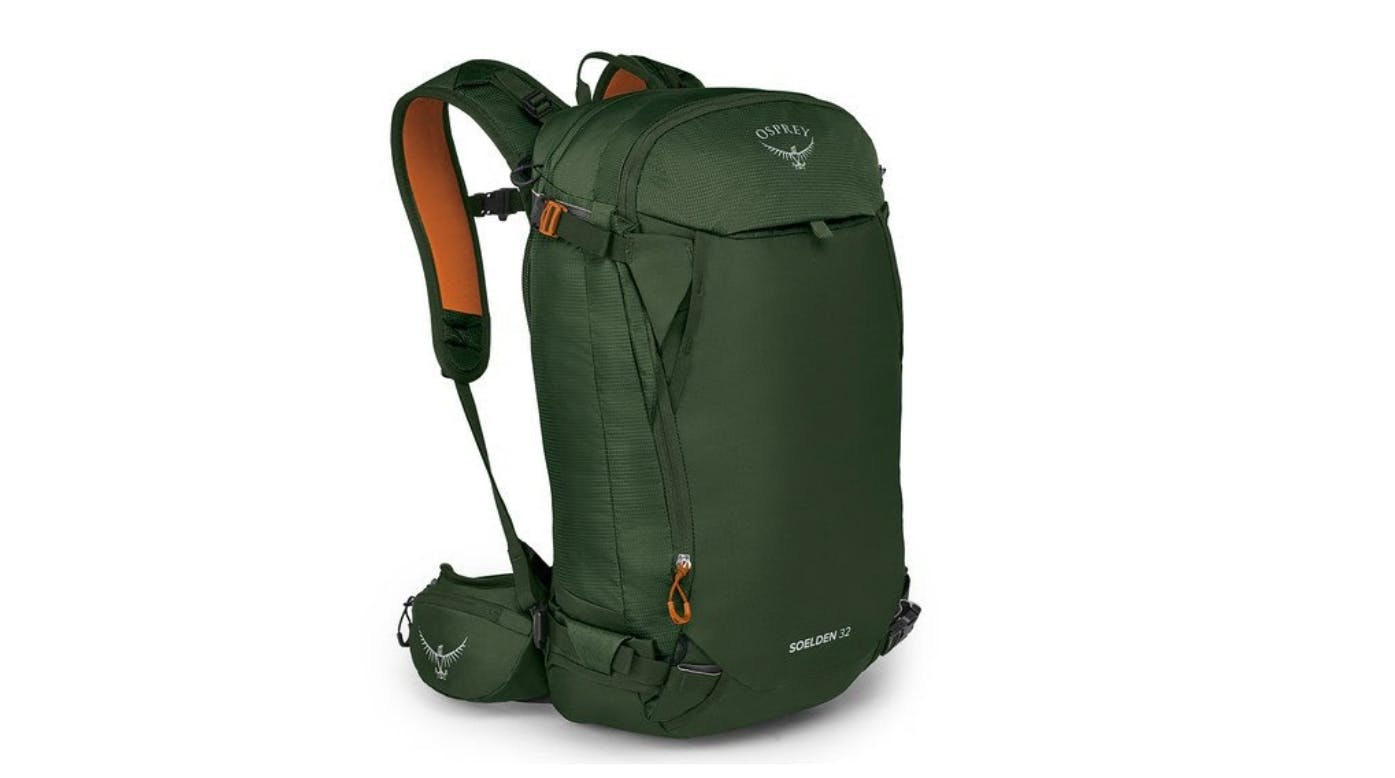 A green Osprey Soeldon 32L backpack with orange zipper pulls.