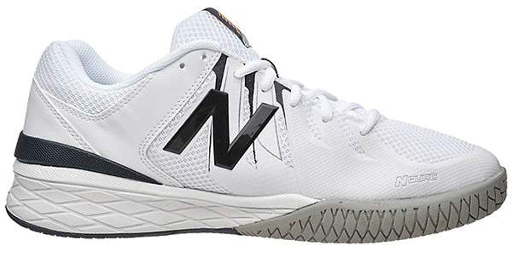 Product image of the New Balance 1006 Tennis Shoes in white and black. 