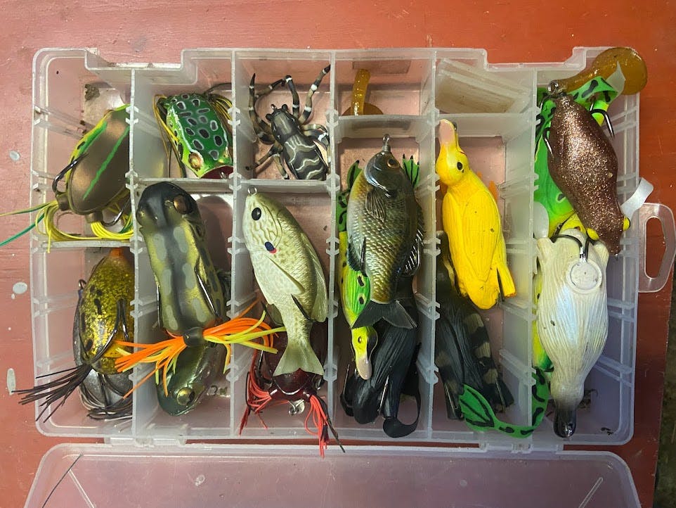 This is an image of my very full box of assorted frog lures. 