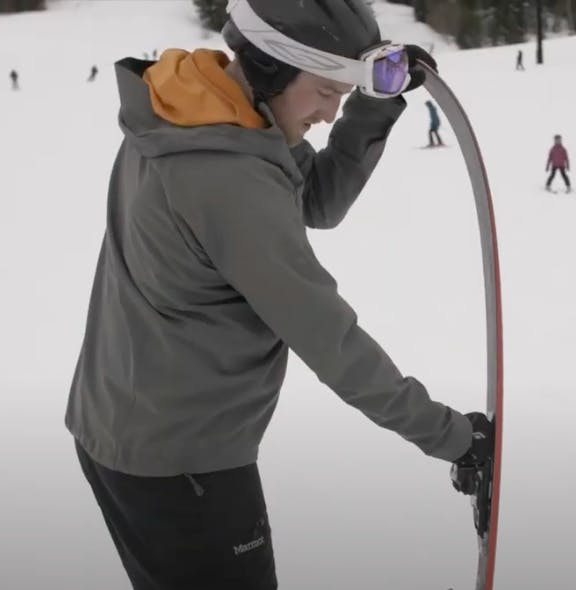 A skier demonstrates flex on a ski