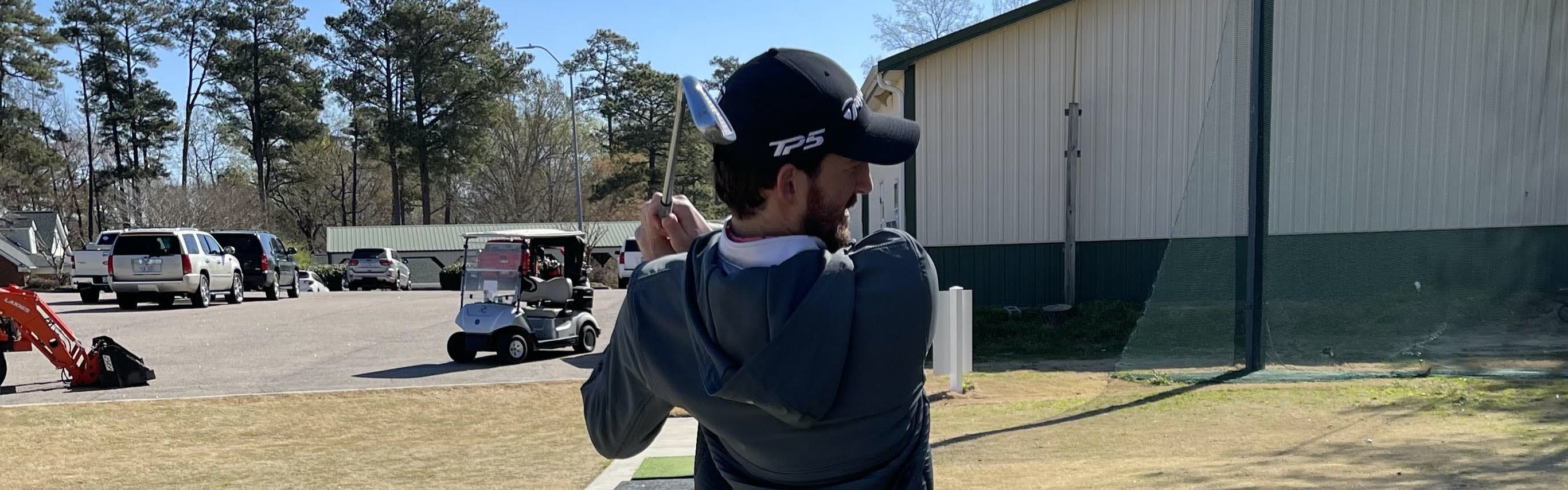 A golfer using the TaylorMade P760 Iron Set. 