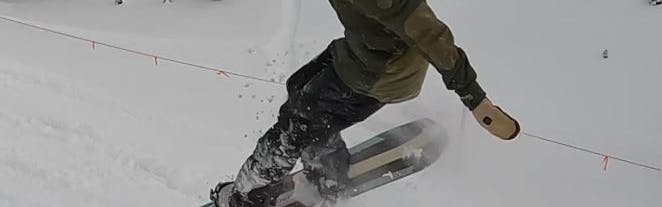 A snowboarder in the Burton Men's Covert Pants. 