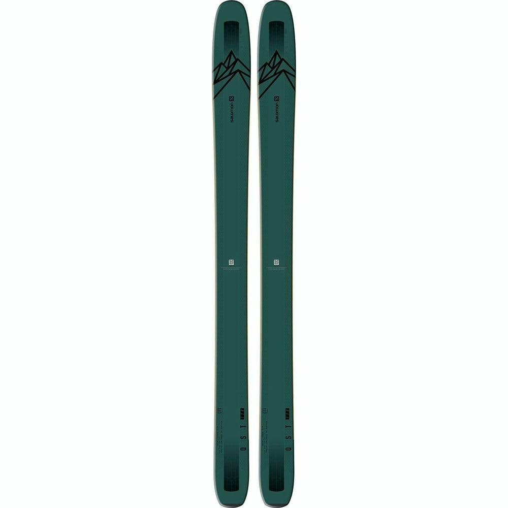 A pair of green skis labelled as Salomon QSTs