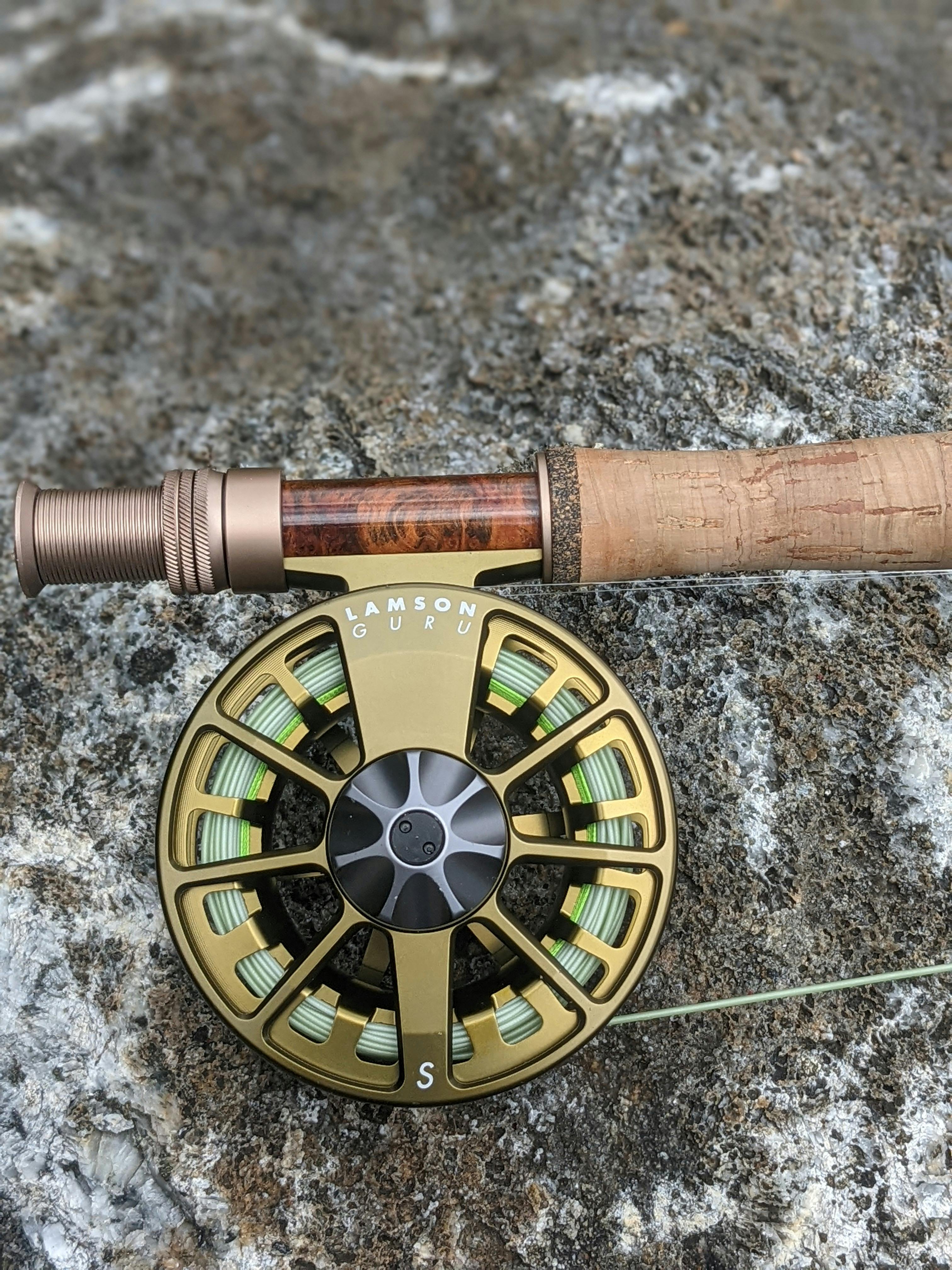A Lamson Guru fishing reel. 