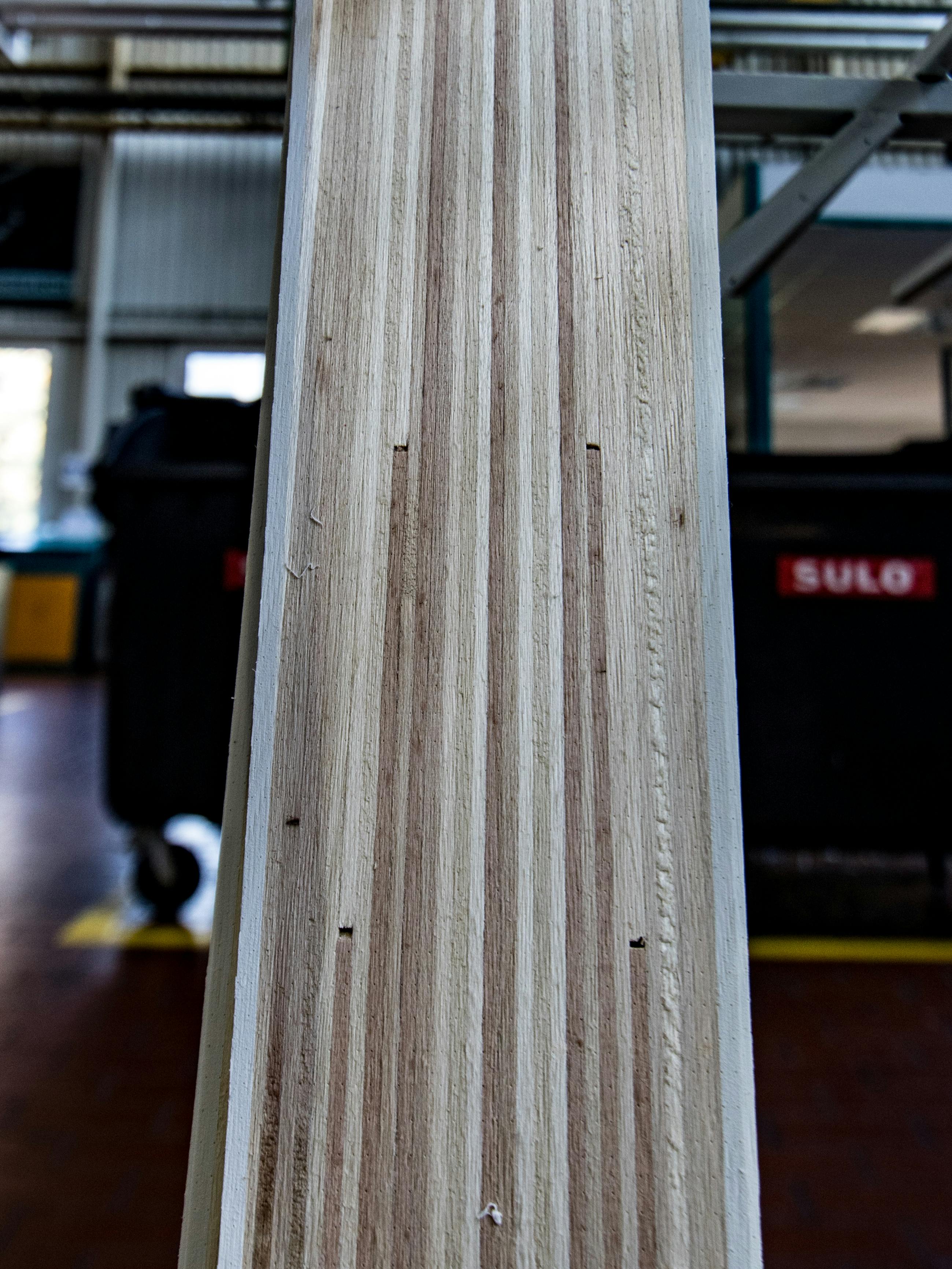 Closeup on the exposed wooden core of a ski