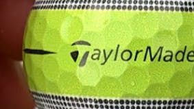 The TaylorMade Tour Response Stripe golf ball.