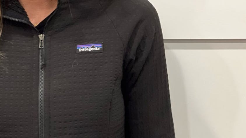 A woman wearing a Patagonia R2 Jacket. 