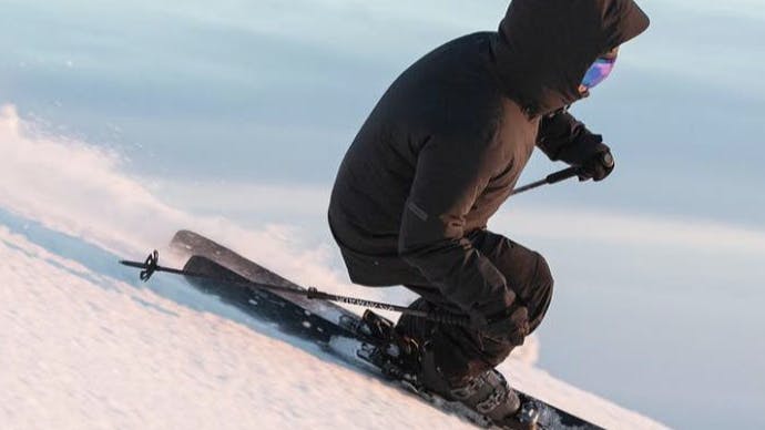 A skier turning on the  Armada Declivity 102 TI Skis · 2021.