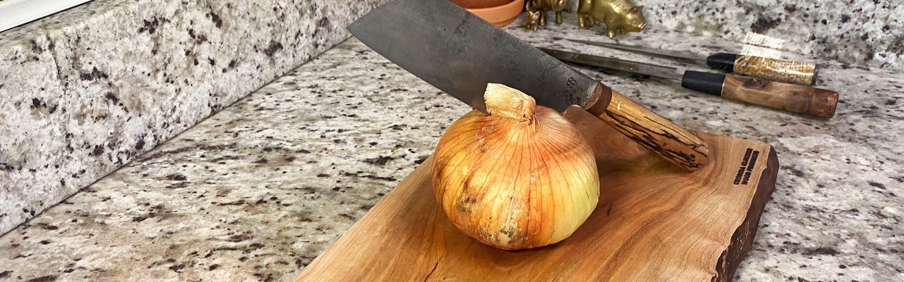 A knife placed into an onion