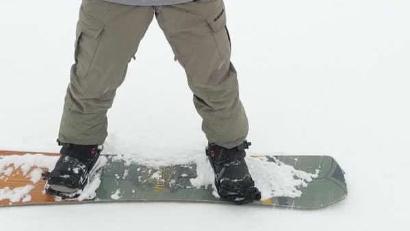 A snowboarder in the Burton Moto BOA Snowboard Boots · 2021.