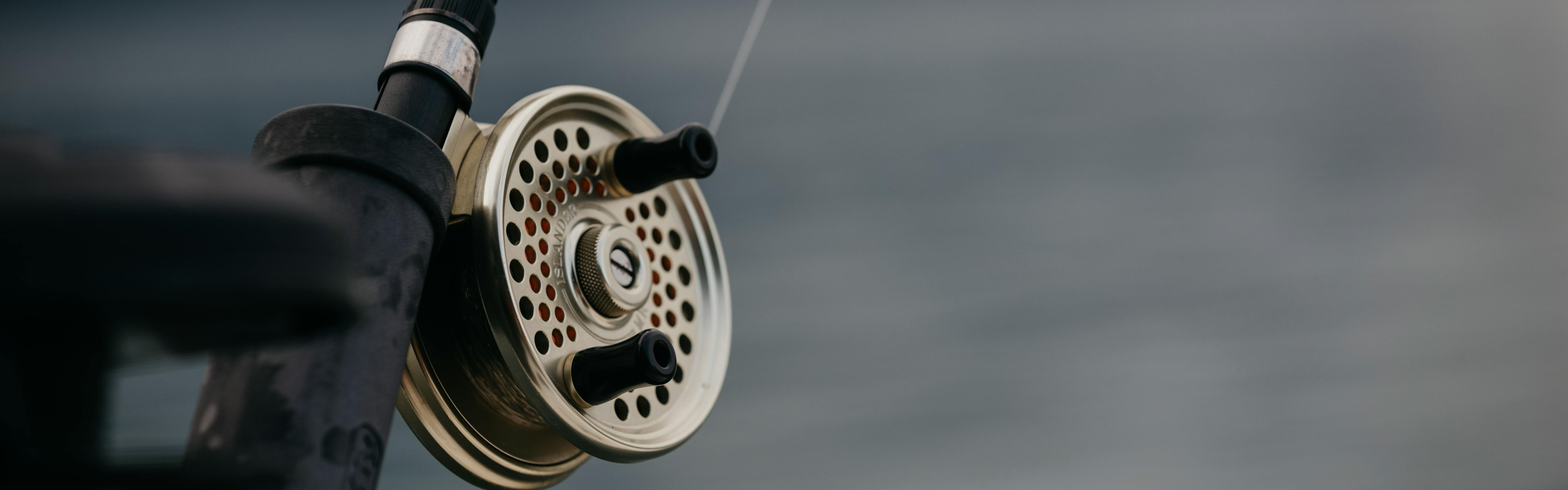 Close up of a fishing reel.