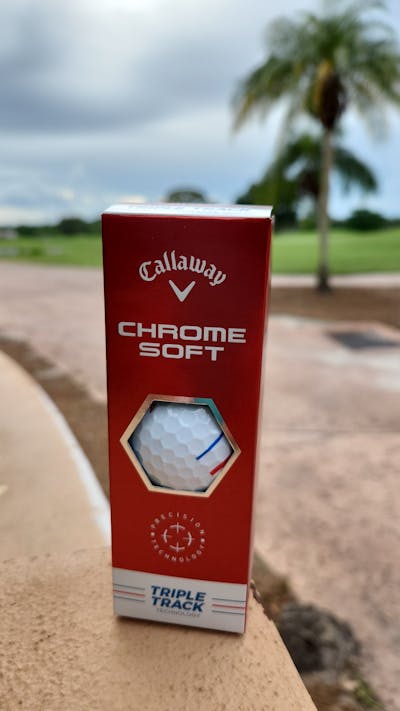 A box of Callaway 2022 Chrome Soft Triple Track Golf Balls.
