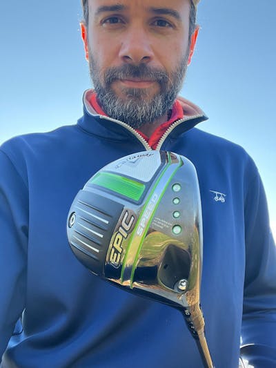 This is a selfie of Paul Gaita holding the club head of the Callaway Epic Speed driver in front of him. 