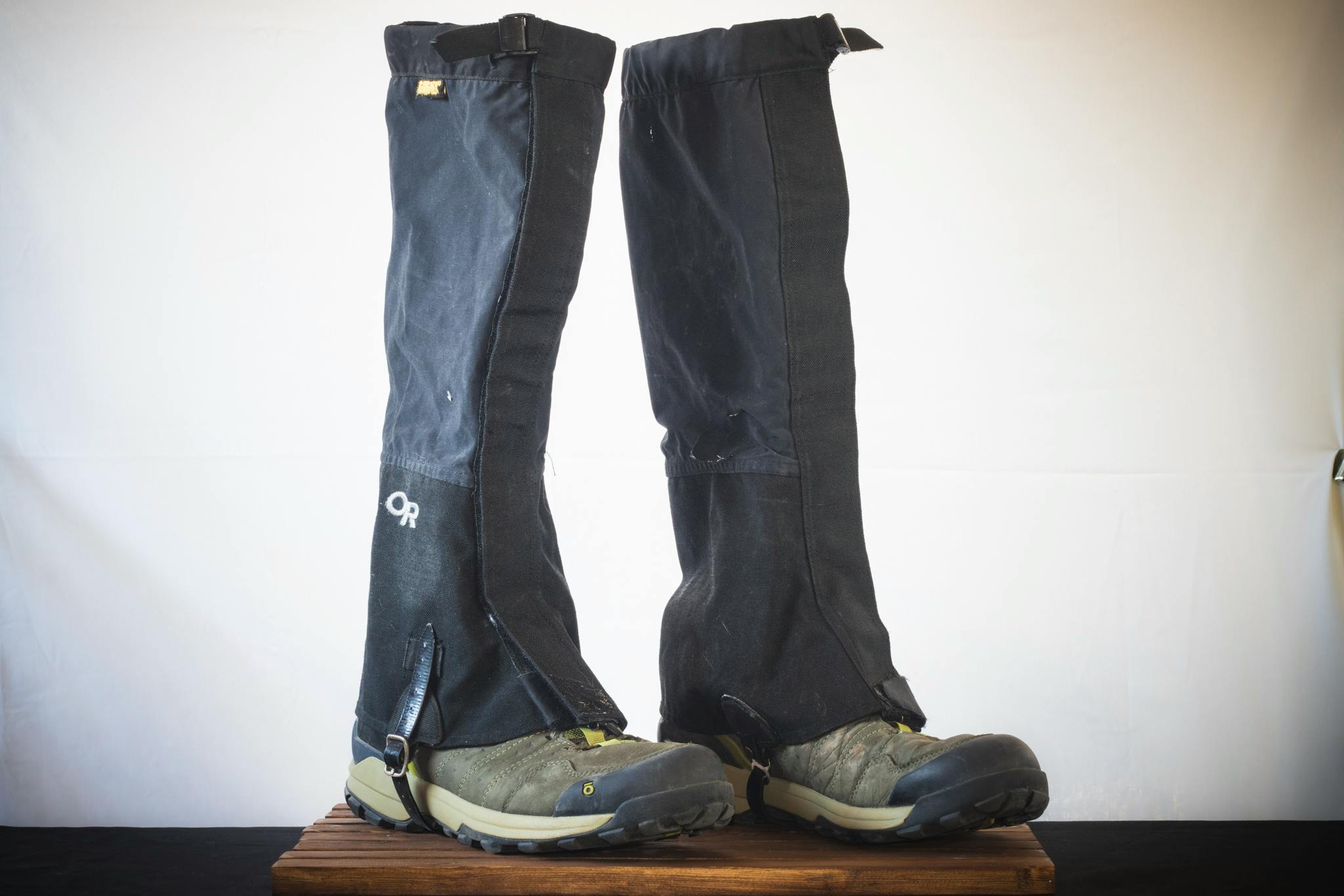 A pair of shoes with some long gaiters.