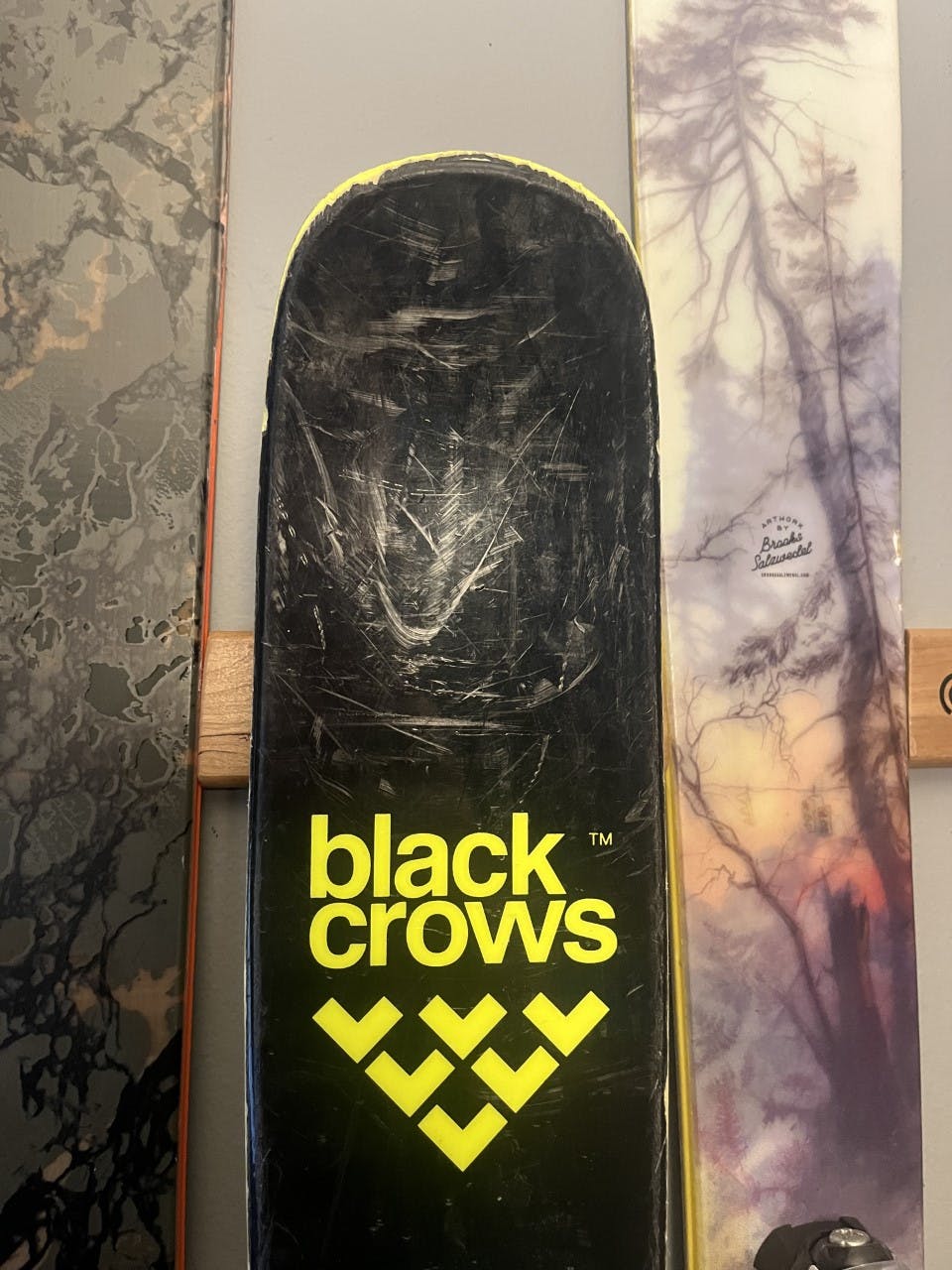 Close up of the tip of the The Black Crows Atris skis. 