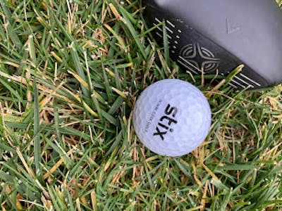 A Stix + Vice Drive Golf Ball.