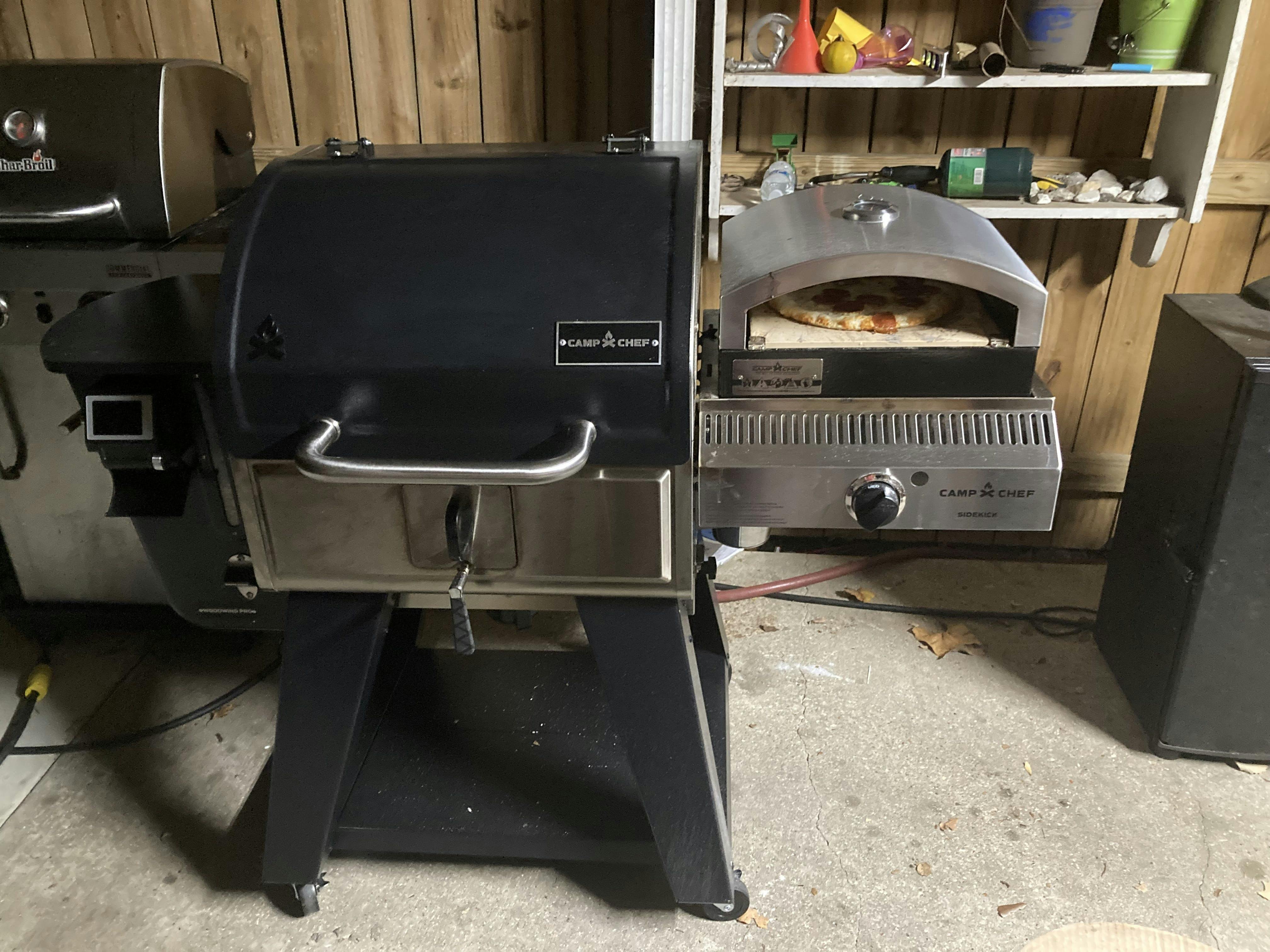 Camp Chef Woodwind Pro with propane side burner and pizza oven attachment.