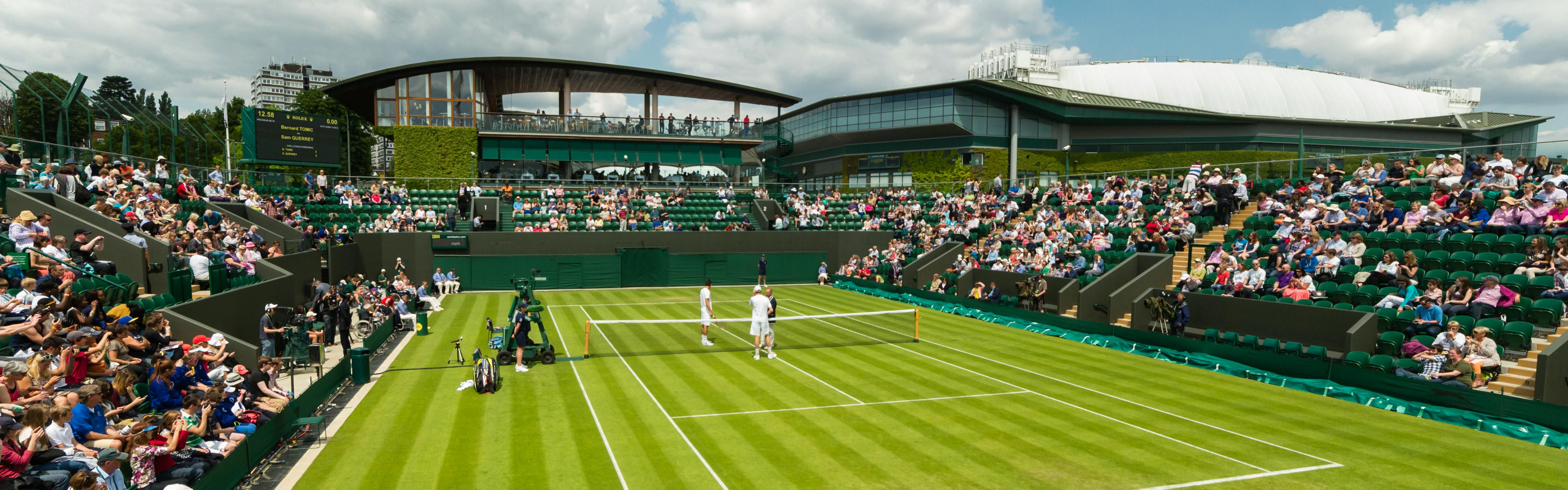 The grass court at Wimbledon during a match. 