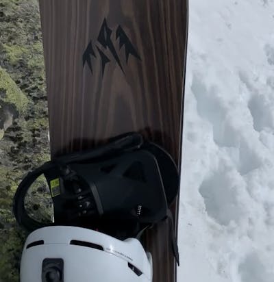 The Burton Step On Re:Flex Snowboard Bindings mounted to a snowboard. 