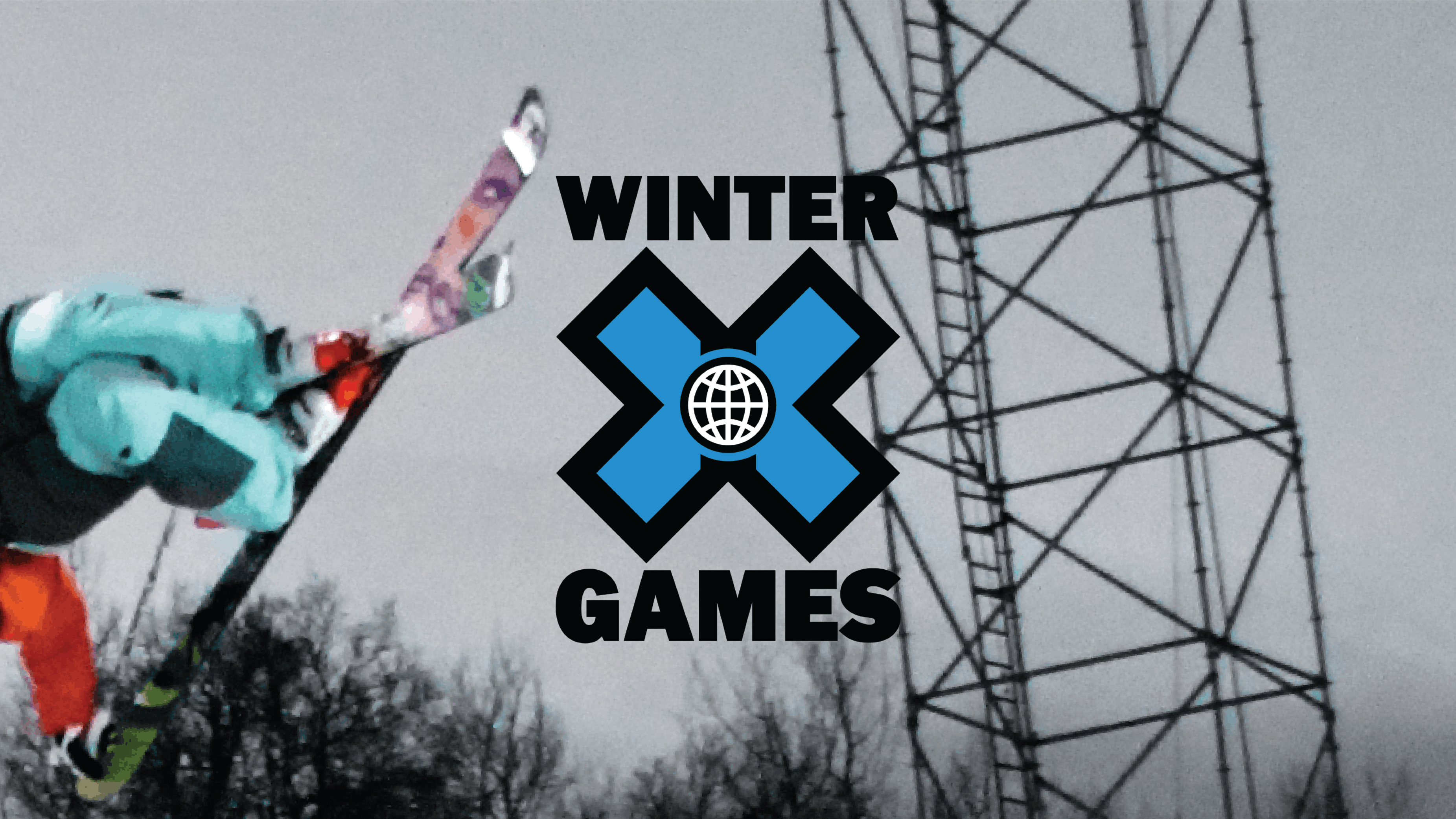 A skier jumps in the halfpipe at the Winter X Games. The Winter X Games logo is in the center of the image.