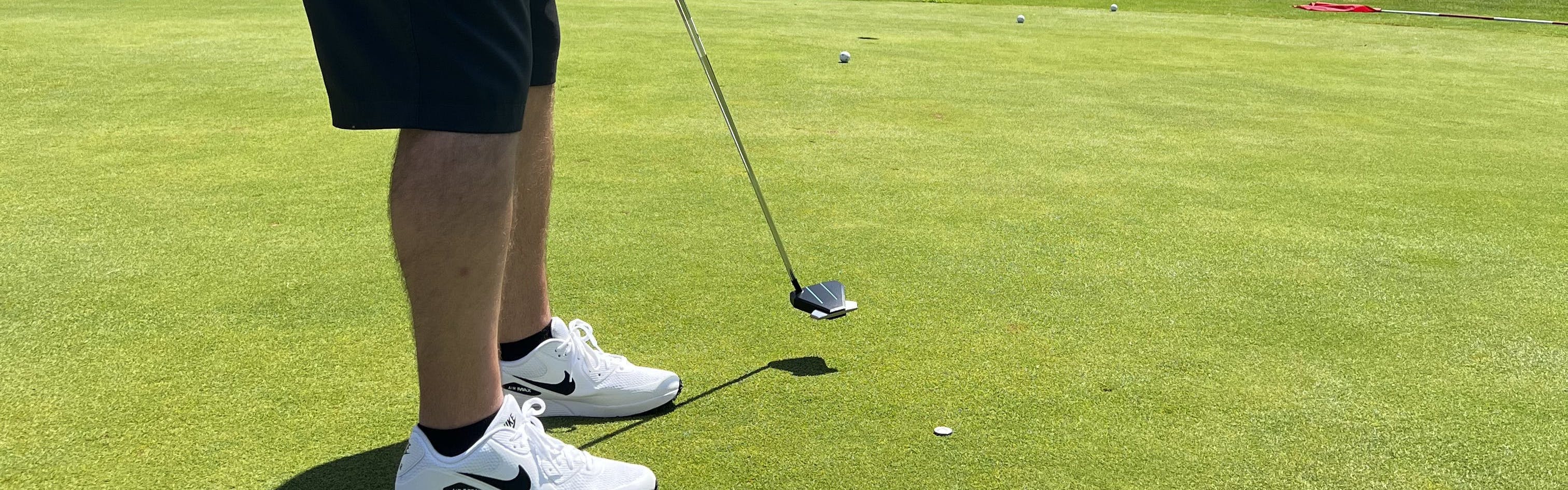 A man putting with the Indi Golf Jett Putter.