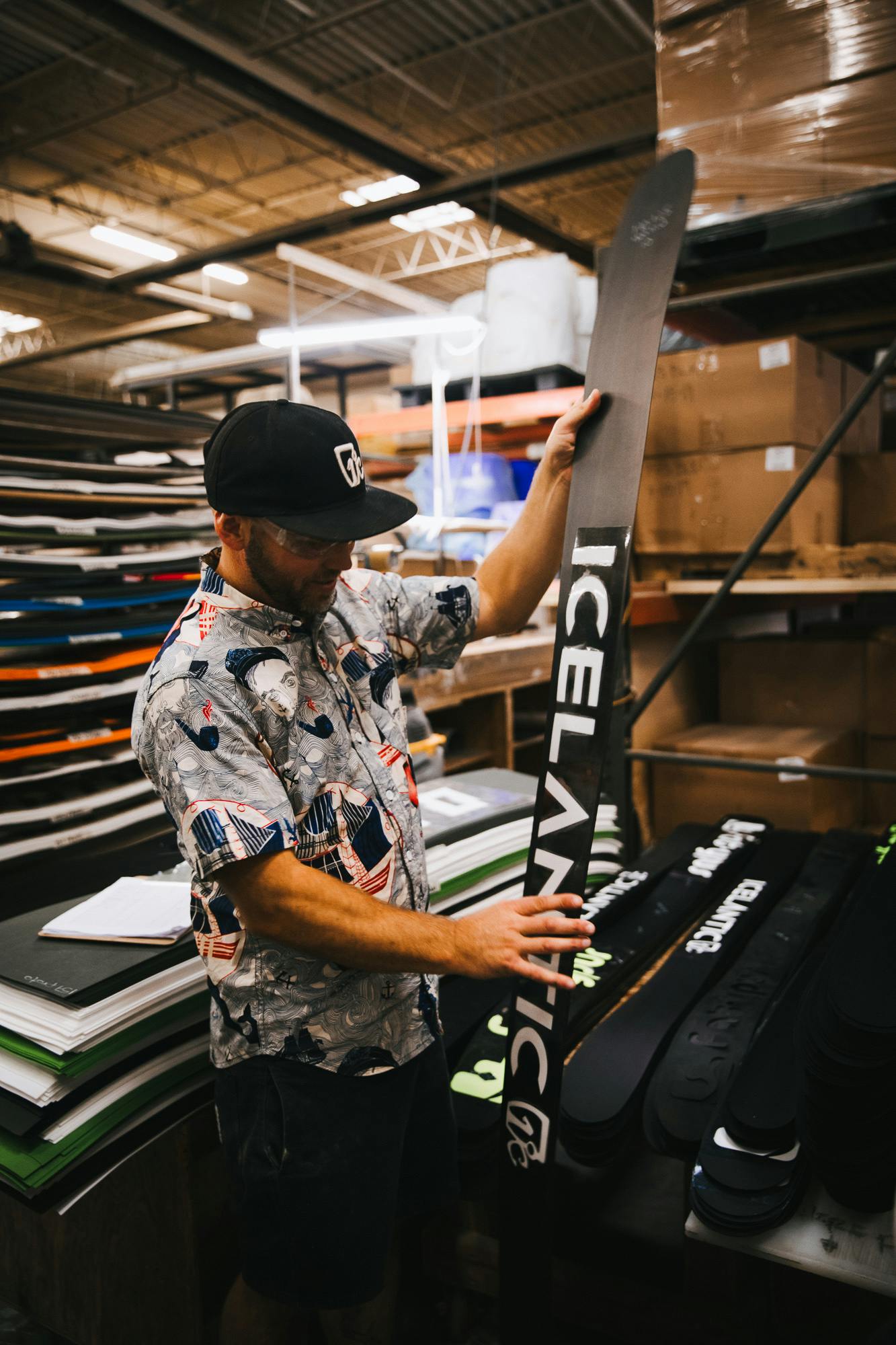 A man working on an Icelantic ski in the factory