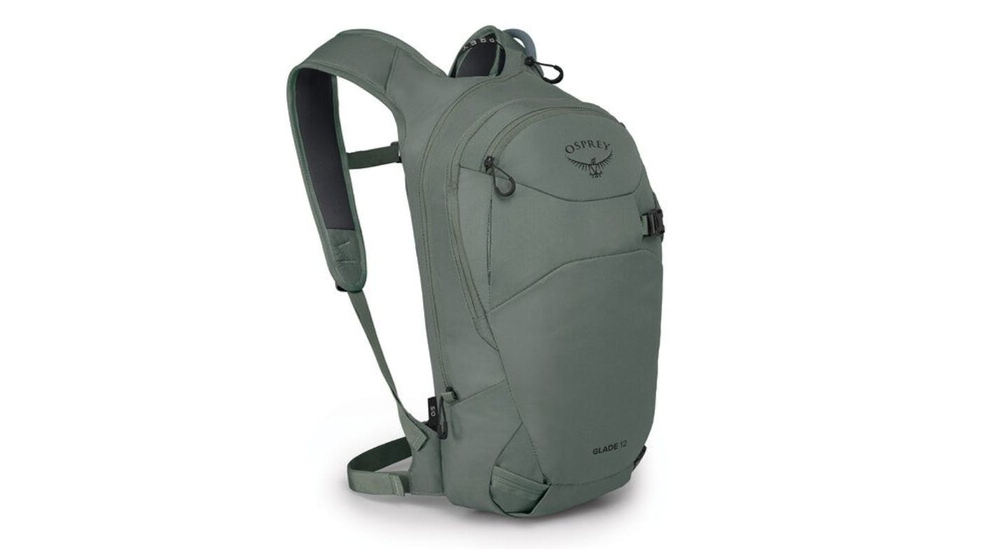 A green/blue Osprey Glade 12L backpack.