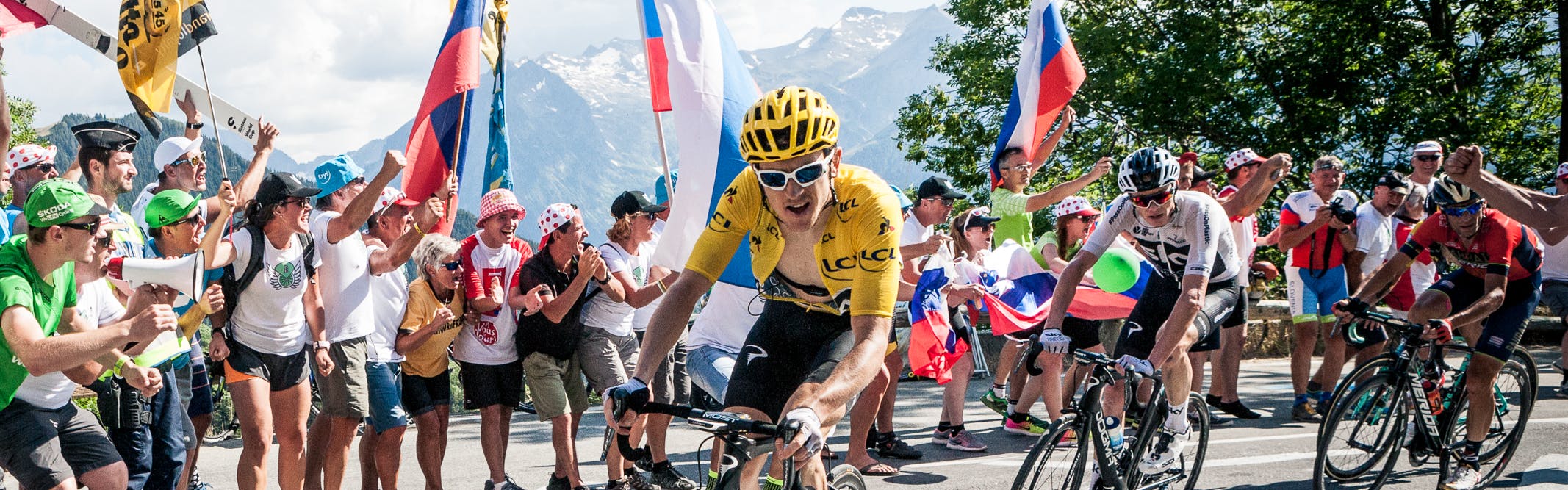 Geraint Thomas wears the Yellow Jersey while riding in the 2018 Tour de France.