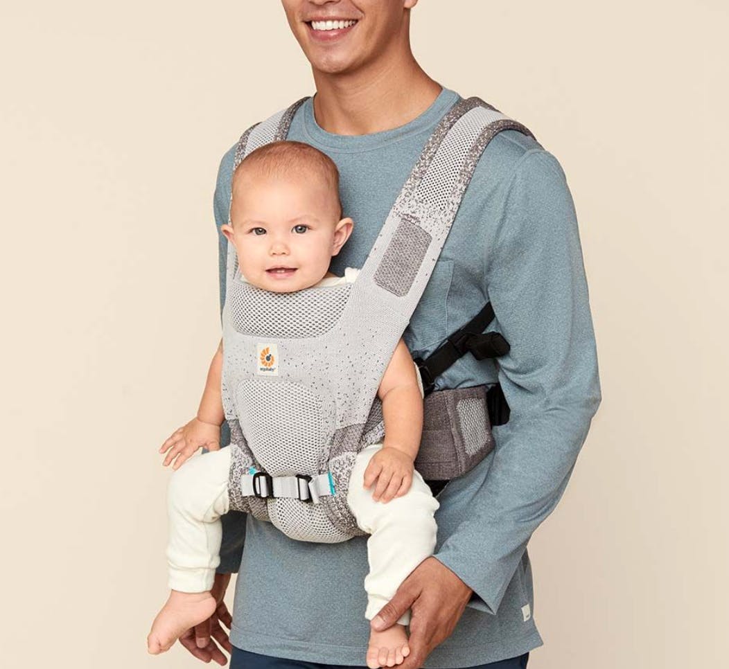 Man using the baby Aerloom carrier from Ergo.