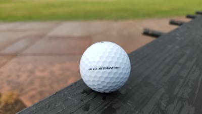 The back of the Srixon Q-Star Golf Ball. 