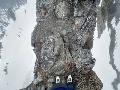 Looking down both sides of the knife-edge ridge with the Scarpa Maestrale RS Ski boots. 