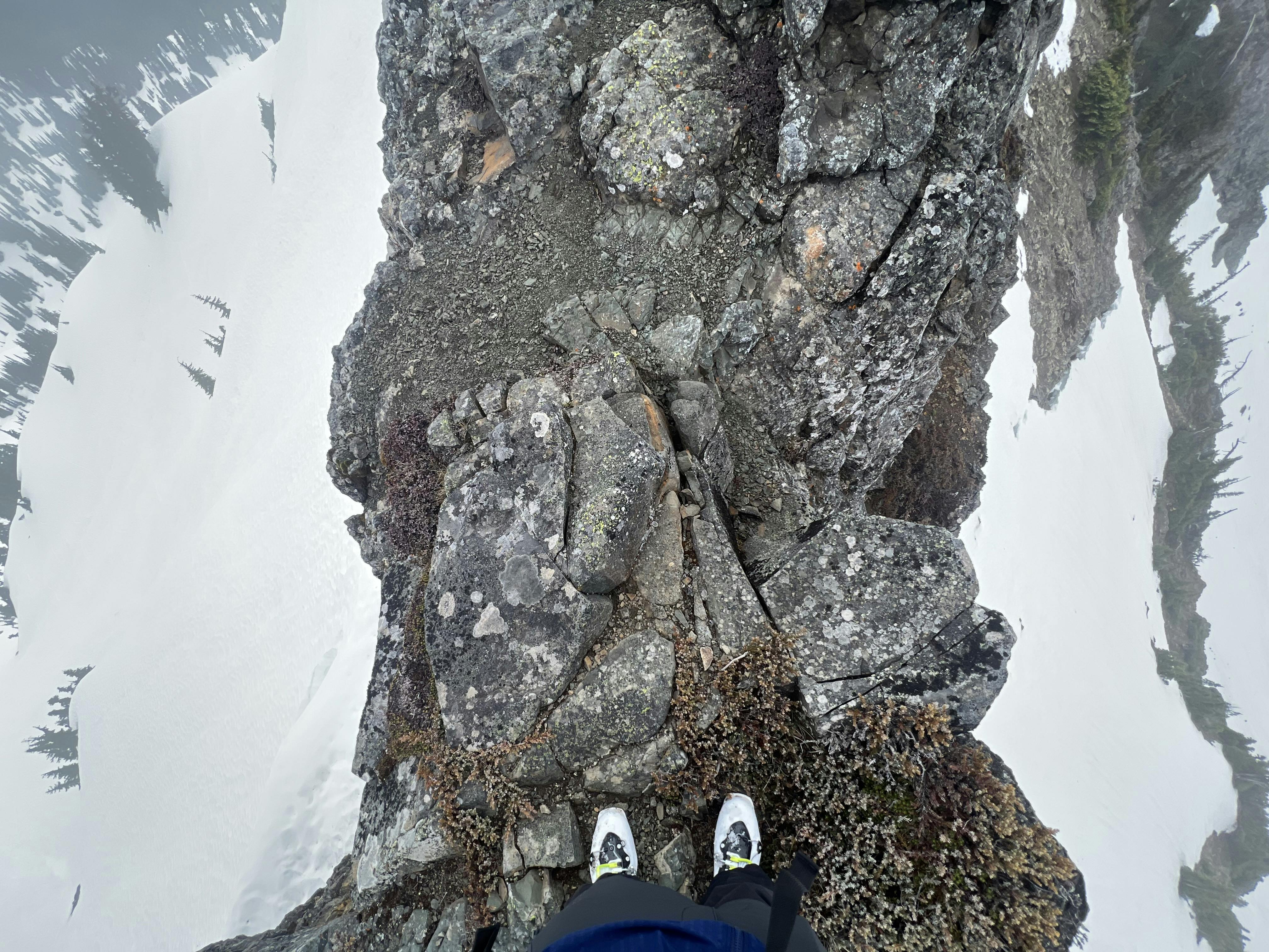 Looking down both sides of the knife-edge ridge with the Scarpa Maestrale RS Ski boots. 