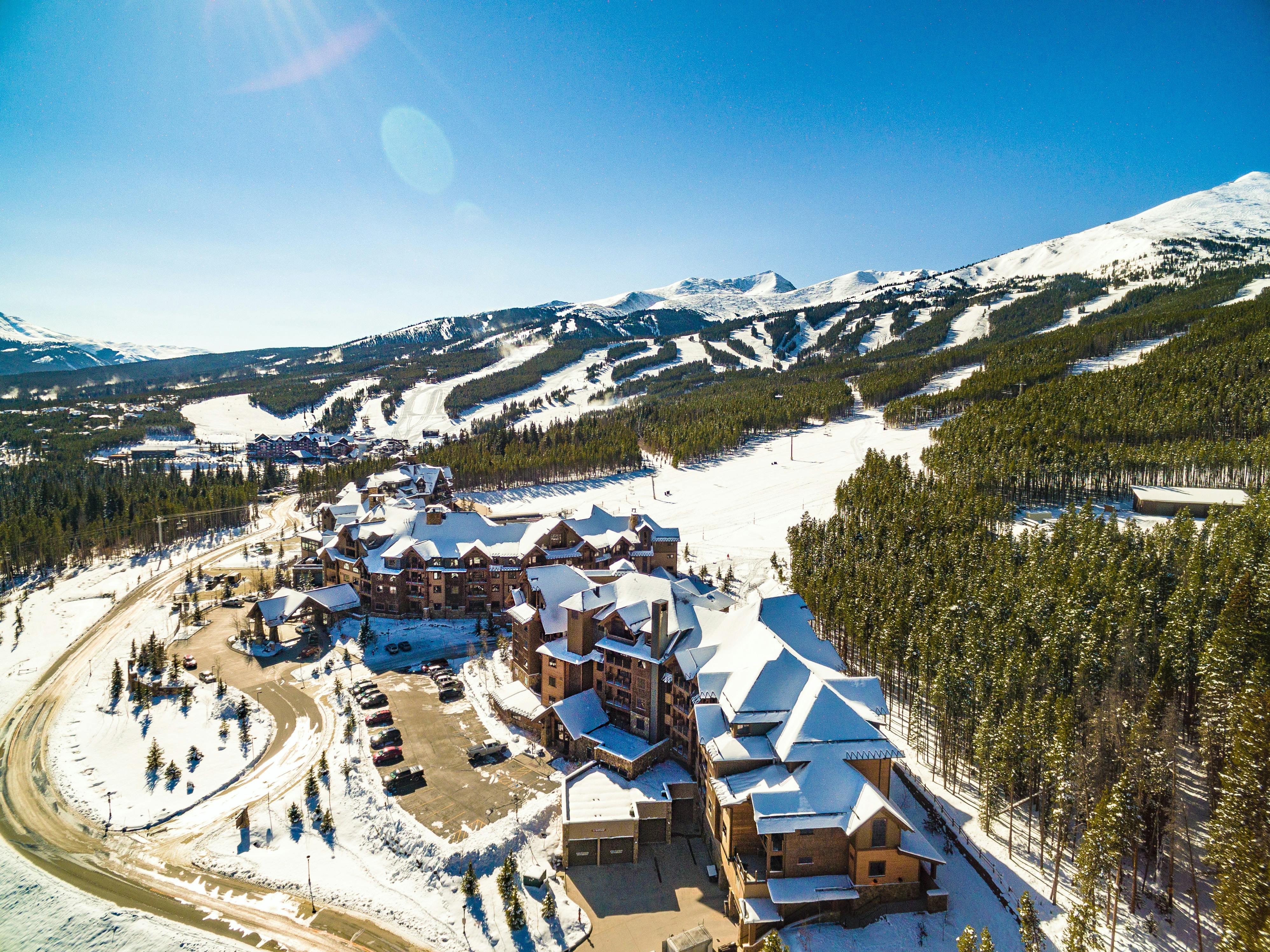 A view of the town of Breckenridge, Colorado with a ski resort in the background. 