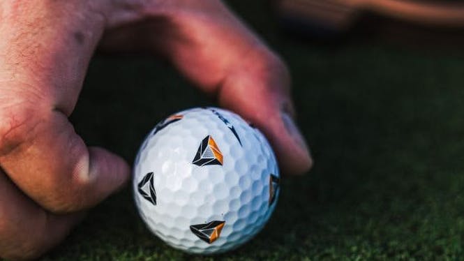 The TaylorMade TP5X Pix 2.0 Golf Balls. 