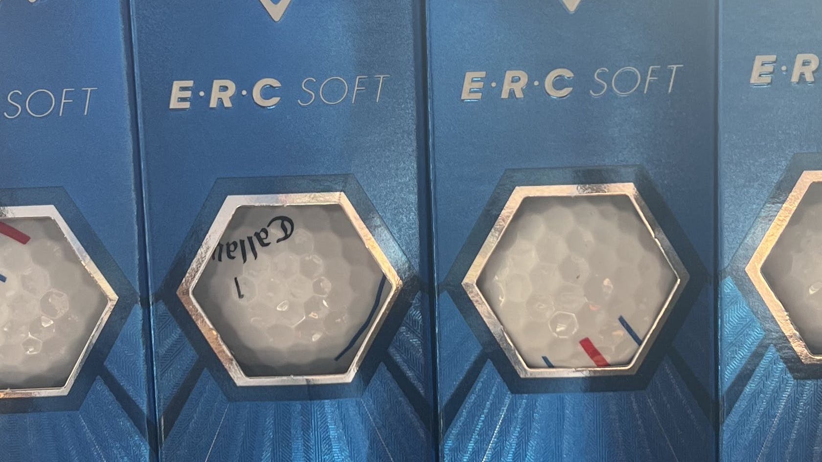 The Callaway 2021 ERC Soft Triple Track Golf Balls in their boxes.