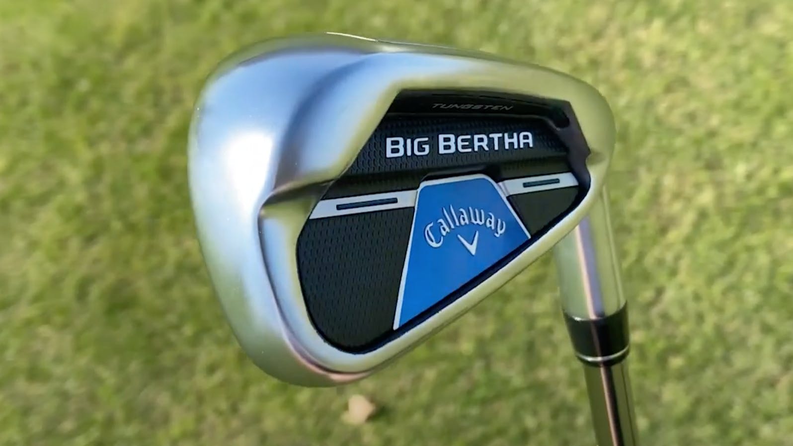 A screenshot from the YouTube video shows a close-up of the clubhead.