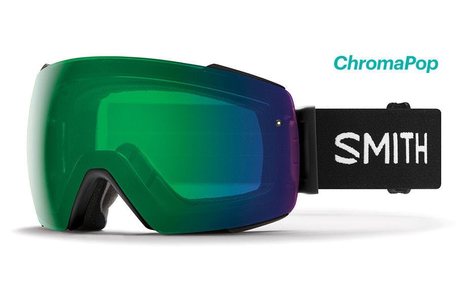 A pair of ski goggles with a green lens and a strap reading "Smith"