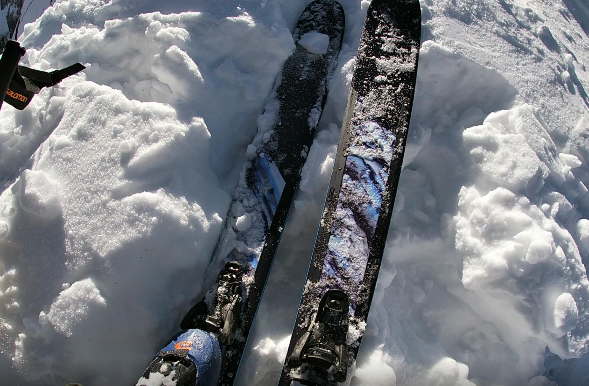 Top down view of the Armada Tracer 108 skis on snow. 