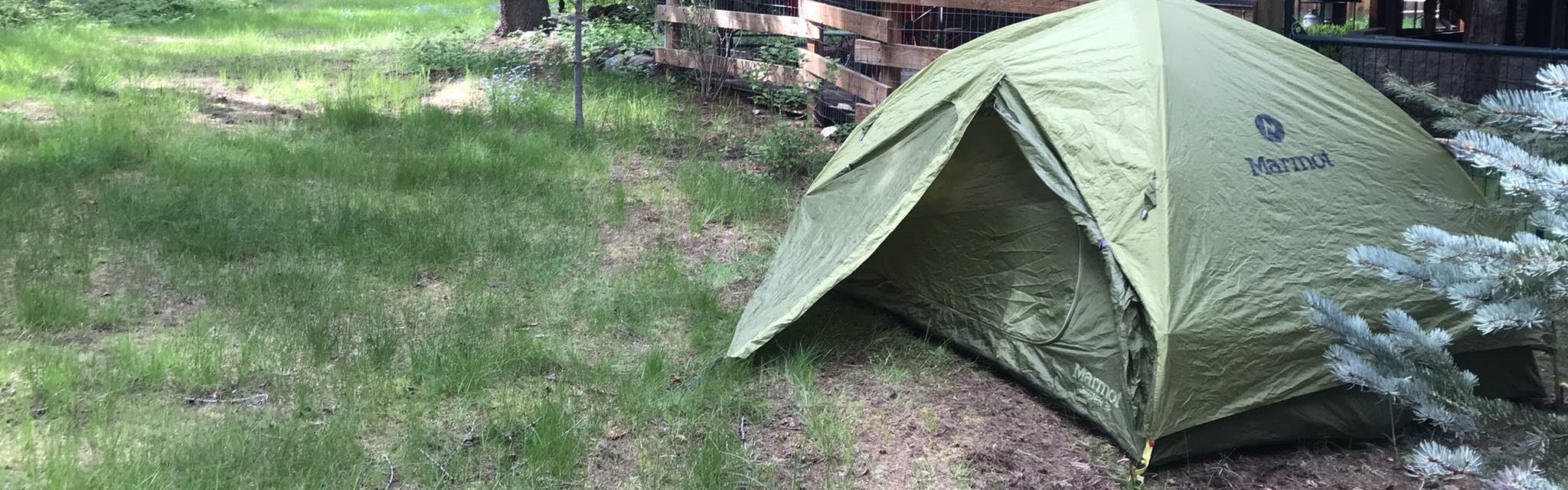 The Marmot Tungsten 3P tent set up in some grass. 