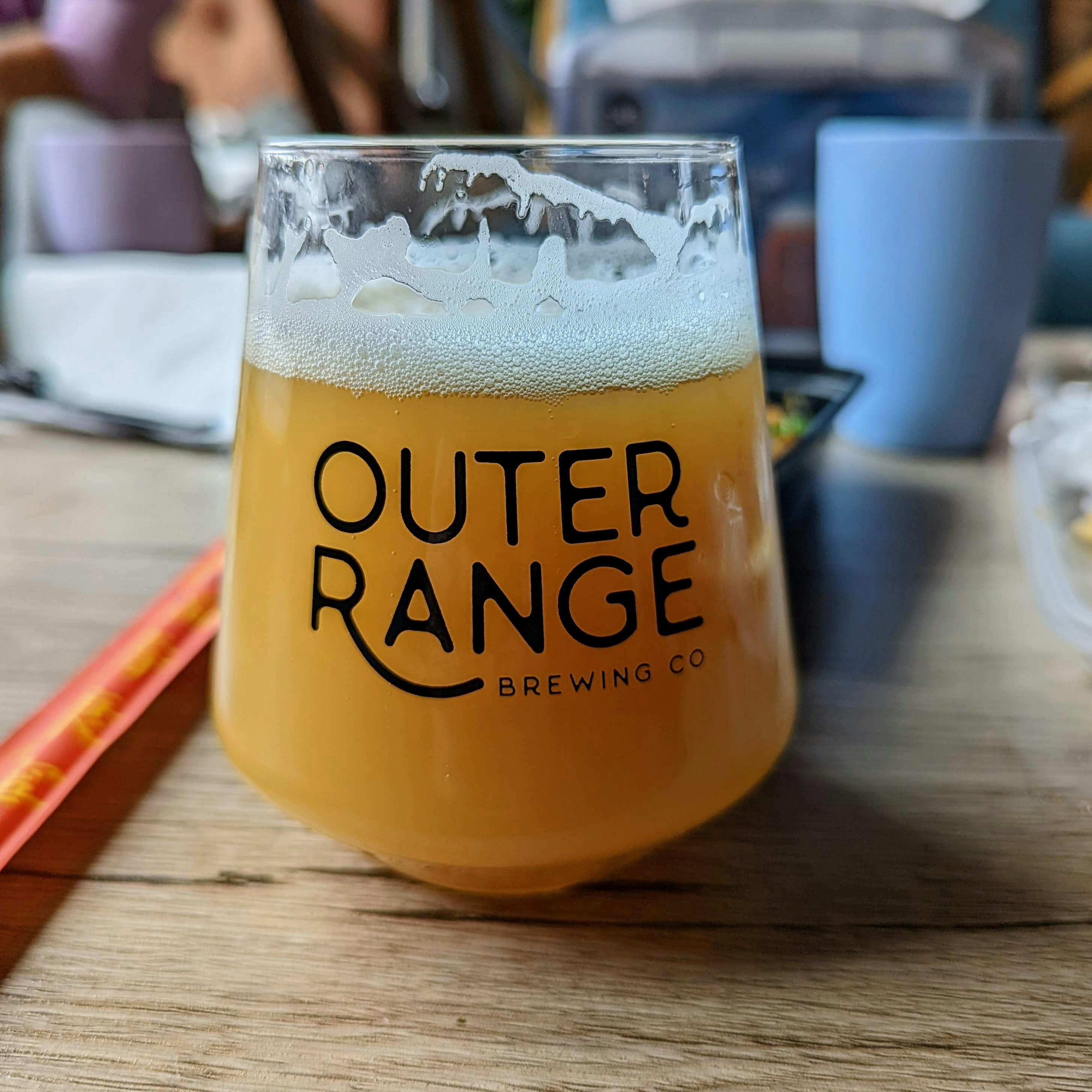 Glass of IPA from Outer Range Brewing Company.