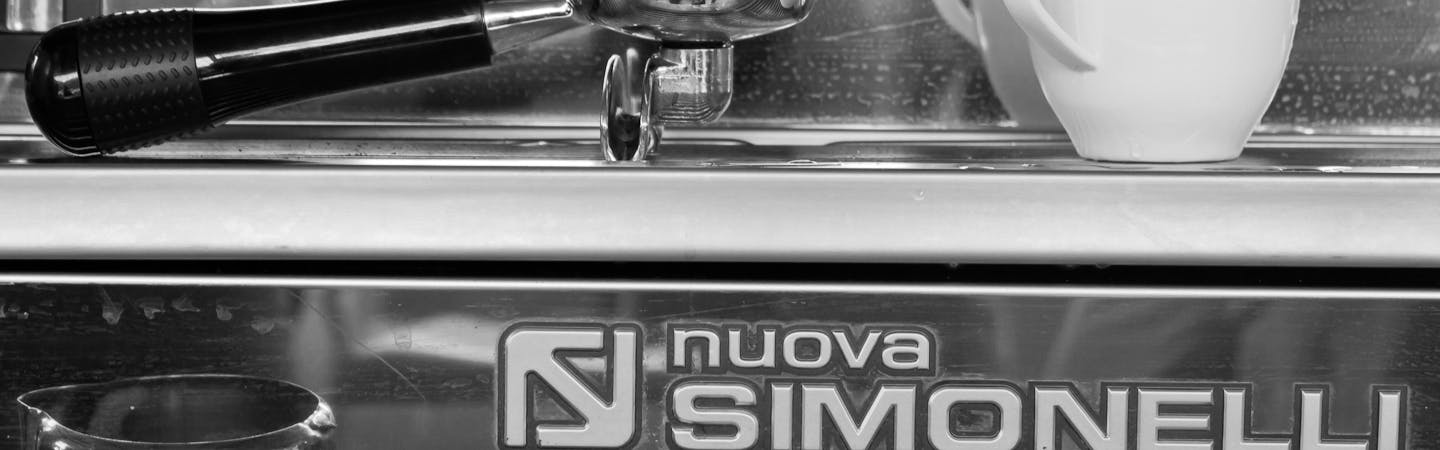 Close up of a Nuova Simonelli espresso machine.