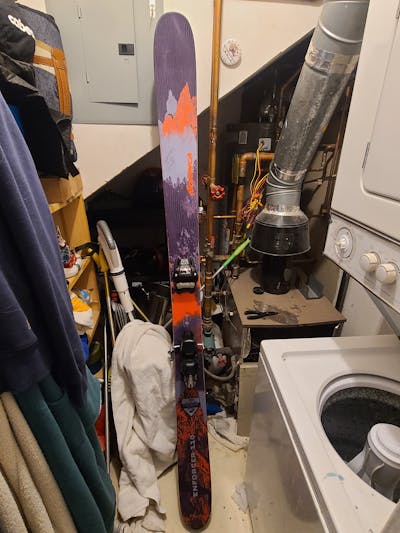 The Nordica Enforcer Free 110 Skis sitting in a house.