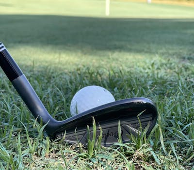 Side view of the Cleveland Golf CBX2 Black Satin Wedge.