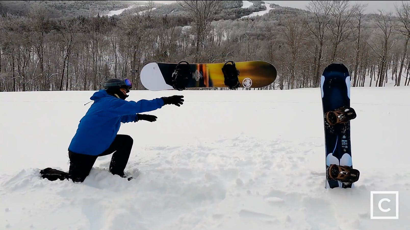 Curated expert Franco DiRienzo launching the Never Summer Harpoon snowboard towards the Lib Tech Orca standing in the snow