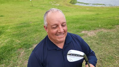 A man smiling at his Callaway MD5 Wedge 1.