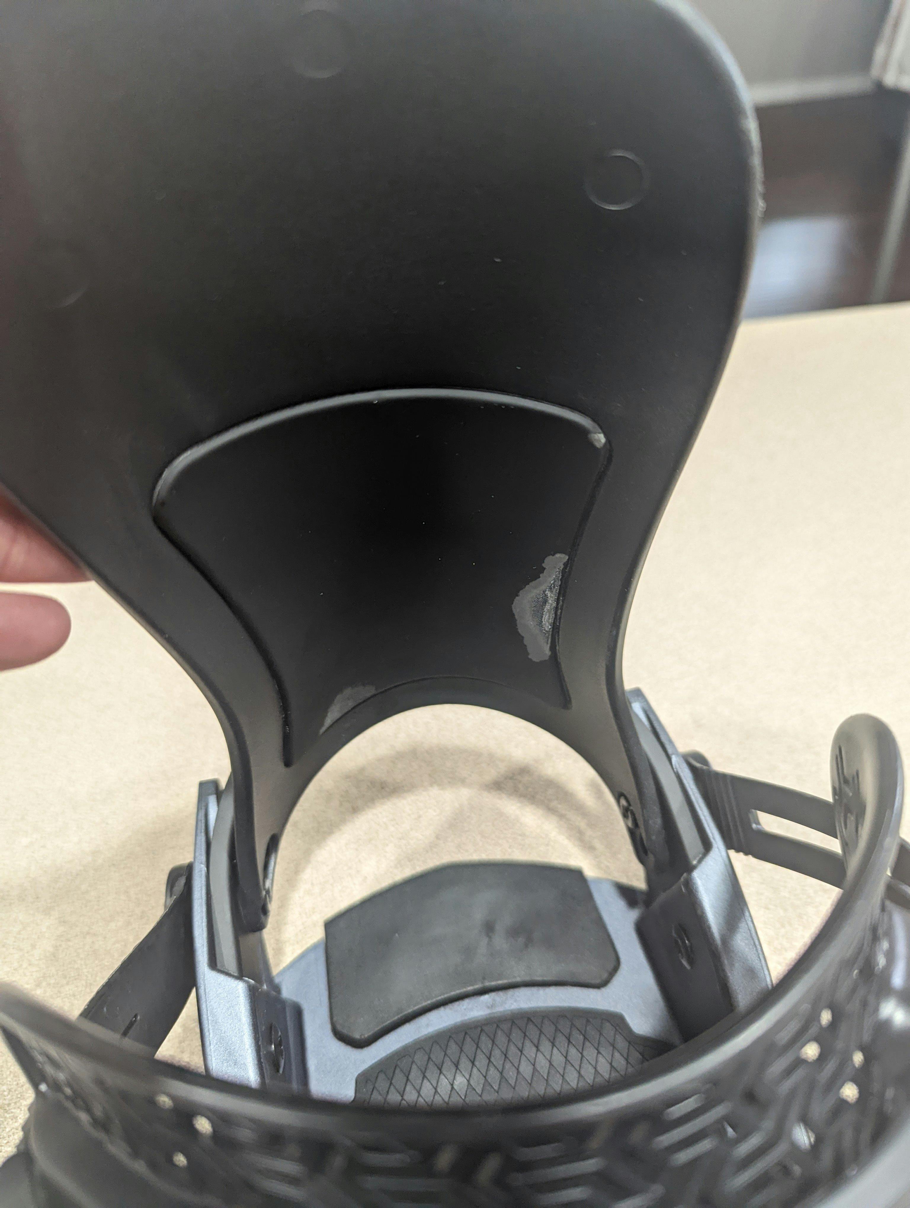 Showing the wear on the inside of the Union Atlas Snowboard Binding.