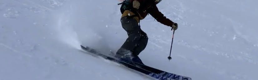 A skier skiing on the Armada Tracer 108 Skis