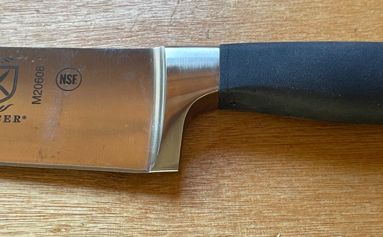 Close up of the Mercer Genesis 8in Chef's Knife.
